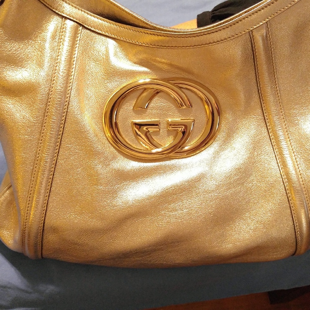Authentic Gold Gucci Guccisima bag, mint condition